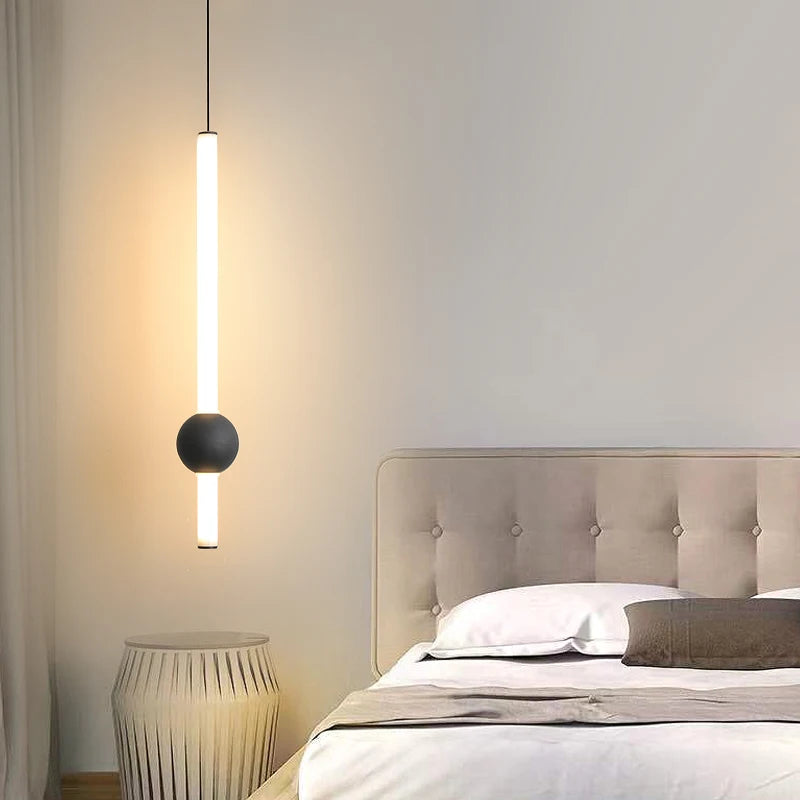 Minimalistische hanglamp naast het bed - moderne LED-lamp met één kop